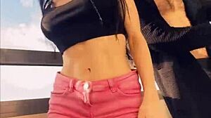 Hot pornstar Sasha Rose dances a seductive striptease outdoors