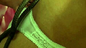 Hot lesbian maid fingering herself passionately