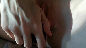 Girlfriend masturbates with black dildo