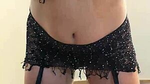 A beautiful Latina dances in lingerie and costumes at home, feeling sexy