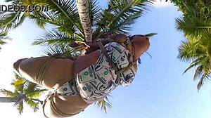 Shibarista Binds Brunette in Outdoor Coconut Tree