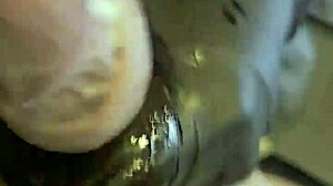 Tattooist drains big balls during intense session