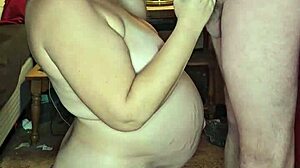 Nine months pregnant woman sucking cock deeply.