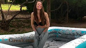 ciren v sploshes clay messily in the pool