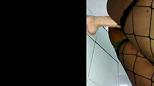 African Mom Enjoys Her Toy Playfully