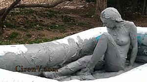 ciren v sploshes clay messily in the pool