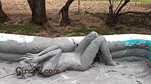 ciren v sploshes clay messily in the pool