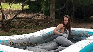 ciren v sploshes clay messily in the pool