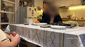 Husband jerks under table while stepmom and I watch in kitchen