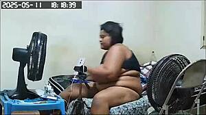 The stepmom shows her huge pussy to her stepson in the bath, teasing him playfully.