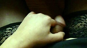 Shemale masturbates in stockings