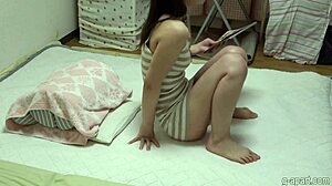 nonoka saki uses dildo to masturbate while reading porn magazine on hidden cam