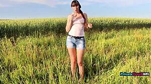 horny russian girl inserts bottle into wet pussy outdoors, feeling every inch deeply