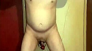 Bisexual amateur humiliates himself on cam with wrist cuffs and anal hook in bdsm electro play