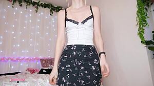 blonde tries on sexy outfits, teasing with striptease