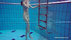 Martina flaunts tight pussy in blue bikini underwater