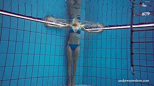 Martina flaunts tight pussy in blue bikini underwater