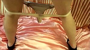 amoul solo in pink satin lingerie