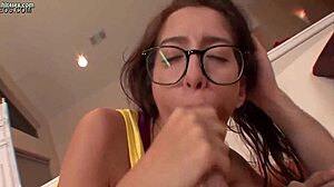 Babe with glasses delighting large penis