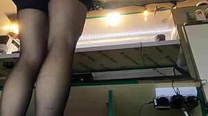 Sexy milf with long legs and big pussy lips serves guests in mini skirt despite winter cold - sexy upskirt at work