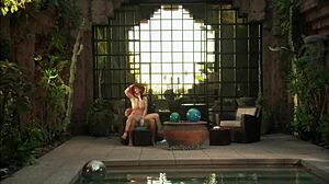 Big-tit brunette Rayveness alternates between sucking and fucking a massive cock until it's drained