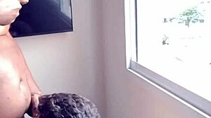 Black stepfather dominates chubby guy at window