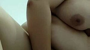 Vietnamese Babe Inserts Bottle Into Her Pussy