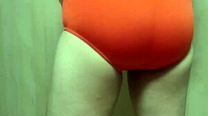 Big Anal Plug Inserted Into Cute Swimsuit Girl's Asshole