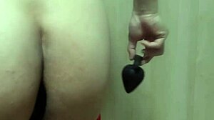 Big Anal Plug Inserted Into Cute Swimsuit Girl's Asshole