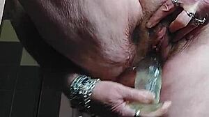 oma fucks pussy with dildo