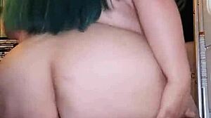 Amateur BBW rides torso, ass shaking, using dildo in homemade scene