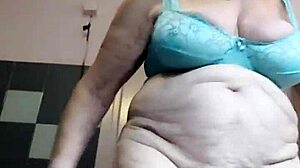 oma fucks pussy with dildo