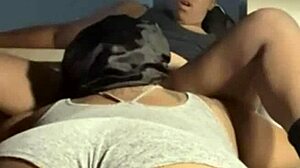 Teasing the swollen clit before eating it out on the desk