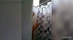 cute latina showering in the bathroom