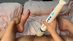 pretty slut shows off shaved pussy big clit and bare feet while moaning to vibrator orgasm