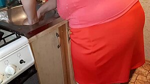 I jerk off to my neighbor in the kitchen while she prepares dinner