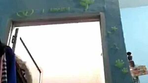 I watch an Indonesian teen girl bathing on webcam, feeling relaxed.