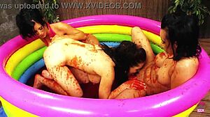 three nasty lesbian sluts feel intense passion wrestling in jelly pool