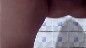 Madura Flashes Big Ass in Public Bathroom Tease