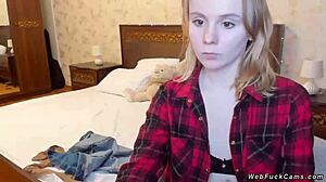 Young Amateur Camgirl Poses in Bra and Shirt