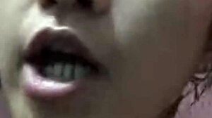 I watch an Indonesian teen girl bathing on webcam, feeling relaxed.