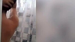 cute latina showering in the bathroom