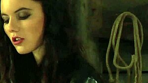 Lesbian slaves pleasuring each other while madame masturbates