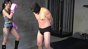 japanese mistress sara performs ballbusting and camel clutch.