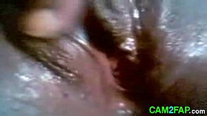 ebony beauty fingers her wet slit on cam teasing viewers