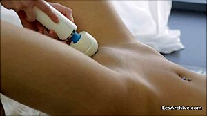 Two lesbian girlfriends grind on vibrating dildo to orgasm