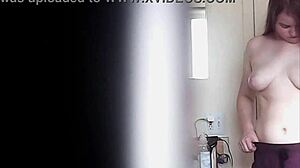 watching this big boobs blonde changing her massive tits