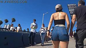 candid voyeur catches big juicy ass bouncing in tight shorts and jeans