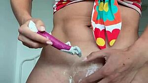 Outdoor shower soaks body before smooth pussy shave reveal