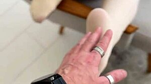 girl toys with her nylon covered feet